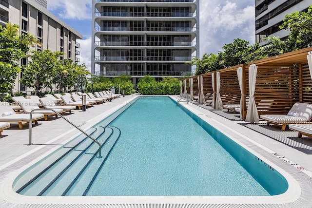 pool featuring a patio