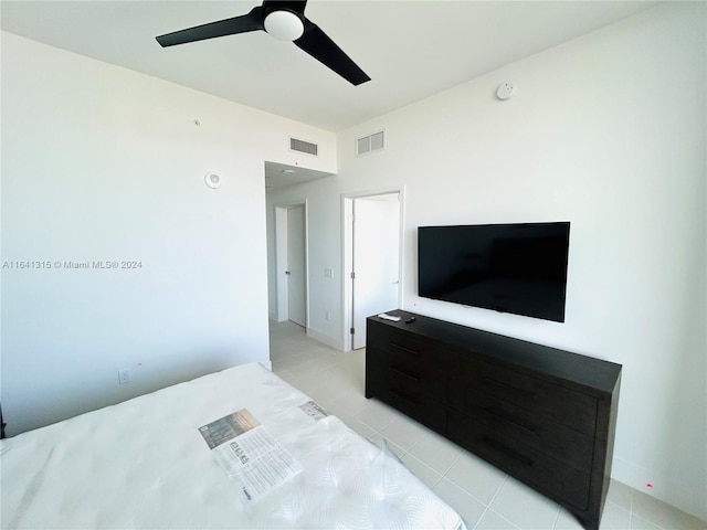 bedroom featuring ceiling fan and light tile patterned floors