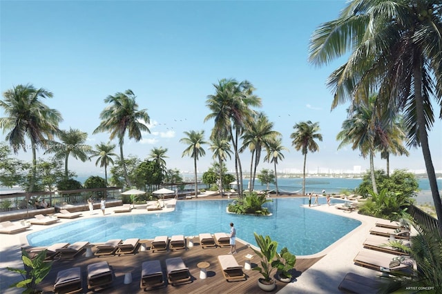 view of swimming pool with a water view