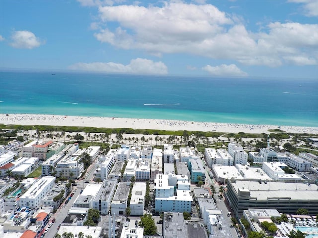 aerial view with a view of the beach and a water view