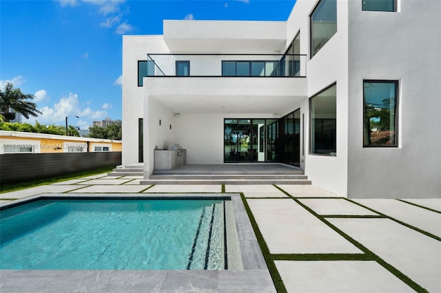 rear view of house with a patio area