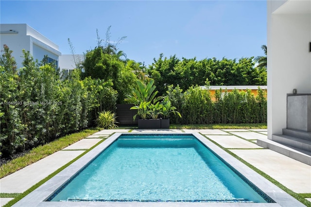250 190th St, Sunny Isles Beach, FL 33160 - swimming pool featuring a patio area and a fenced backyard