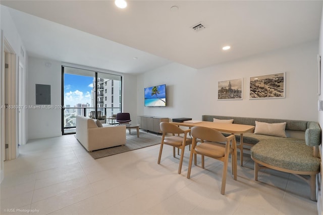 tiled living room with electric panel