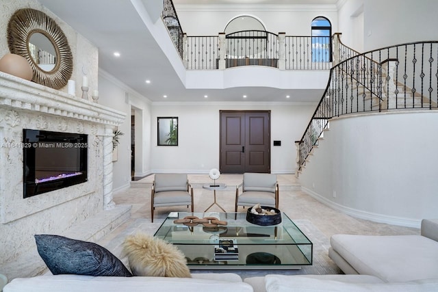 168 Fiesta Way, Fort Lauderdale, FL 33301 - living area with stairs, a towering ceiling, baseboards, ornamental molding, and recessed lighting