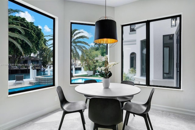 168 Fiesta Way, Fort Lauderdale, FL 33301 - dining room featuring baseboards