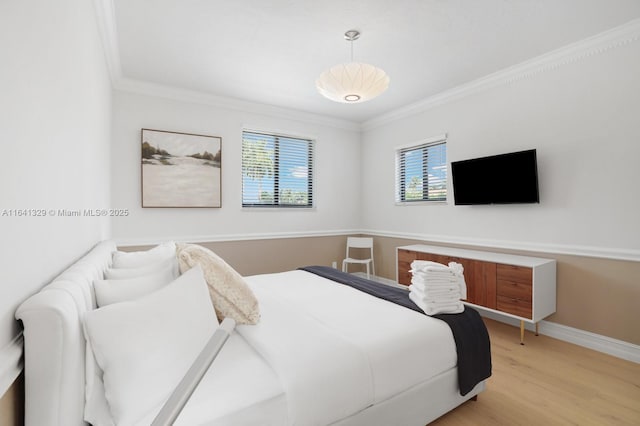 168 Fiesta Way, Fort Lauderdale, FL 33301 - bedroom featuring crown molding, light wood-style flooring, and baseboards