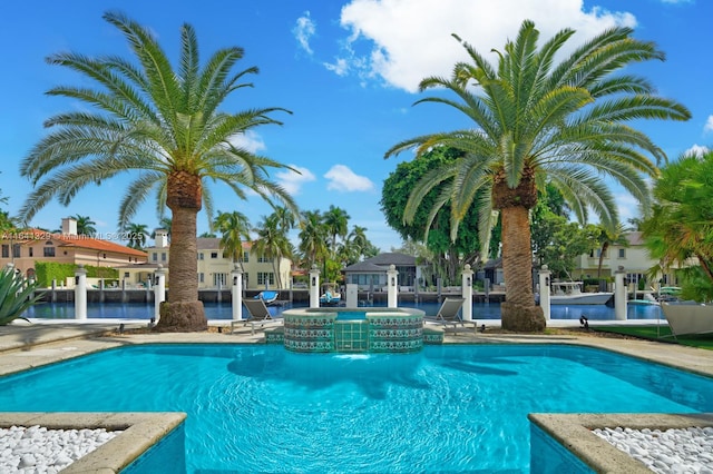 168 Fiesta Way, Fort Lauderdale, FL 33301 - view of pool with a pool with connected hot tub, a water view, and a residential view