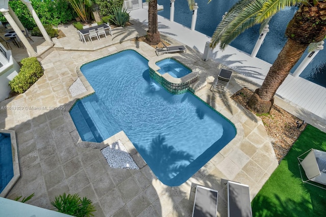168 Fiesta Way, Fort Lauderdale, FL 33301 - view of swimming pool with a patio and a pool with connected hot tub