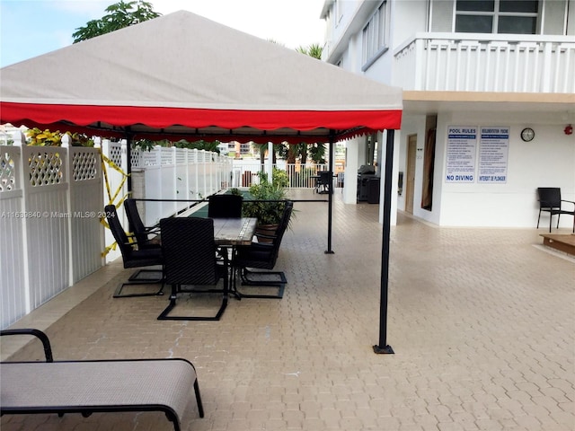 view of patio / terrace featuring a balcony and grilling area