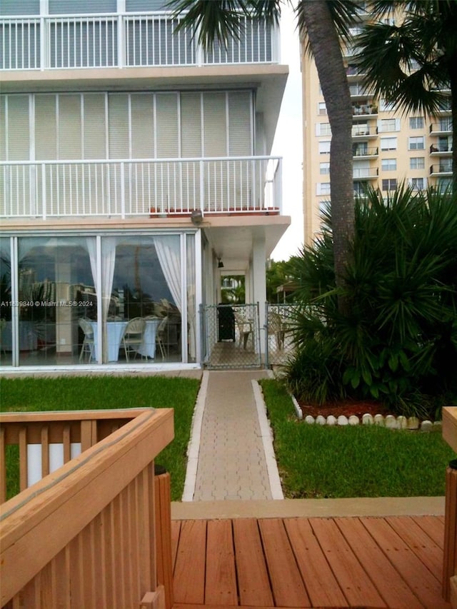 rear view of house with a balcony