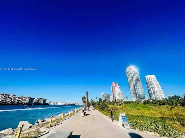 view of property's community featuring a water view