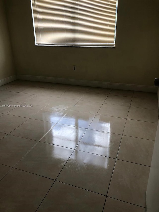 view of tiled empty room