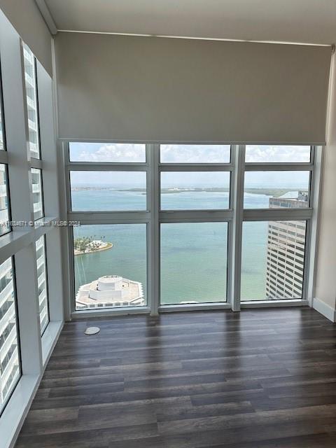 unfurnished sunroom featuring a healthy amount of sunlight