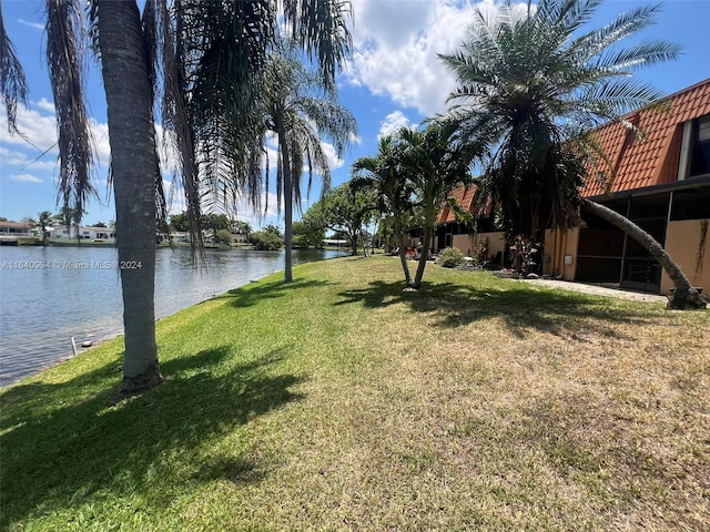 view of yard with a water view