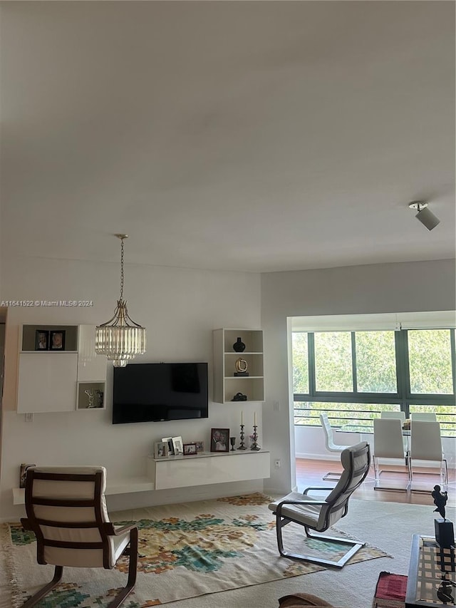 living room with a chandelier