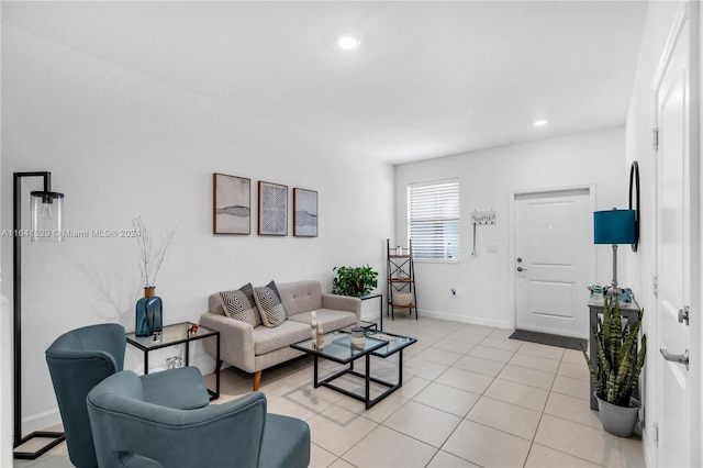 living room with light tile patterned flooring