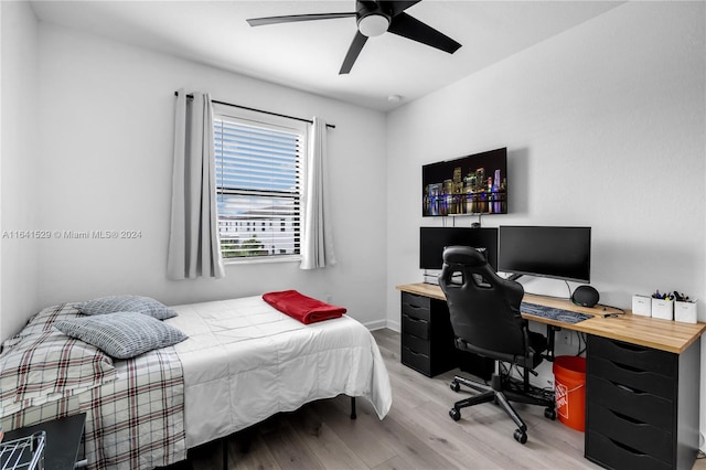 bedroom featuring ceiling fan and light hardwood / wood-style floors