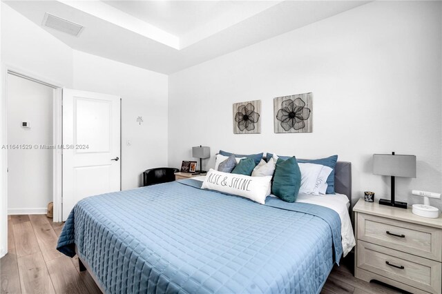 bedroom featuring hardwood / wood-style floors