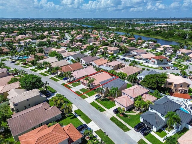 drone / aerial view featuring a water view