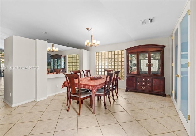 18022 SW 12th Ct, Pembroke Pines, FL 33029 - dining room with a chandelier, light tile patterned floors, and vaulted ceiling
