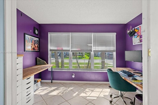 tiled office with a textured ceiling