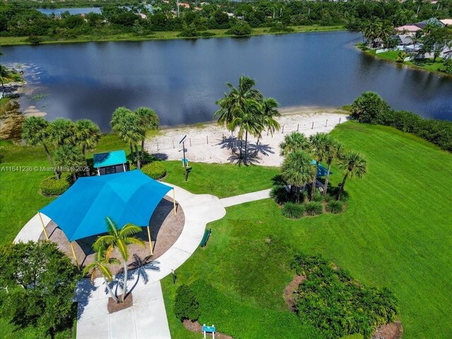 bird's eye view with a water view