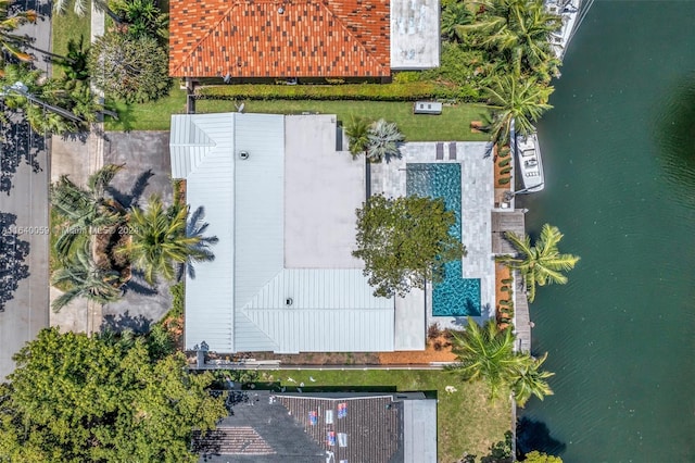 birds eye view of property featuring a water view