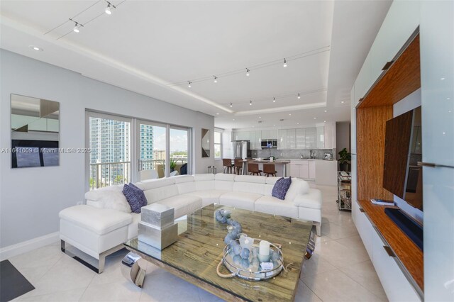 living room featuring light tile patterned flooring