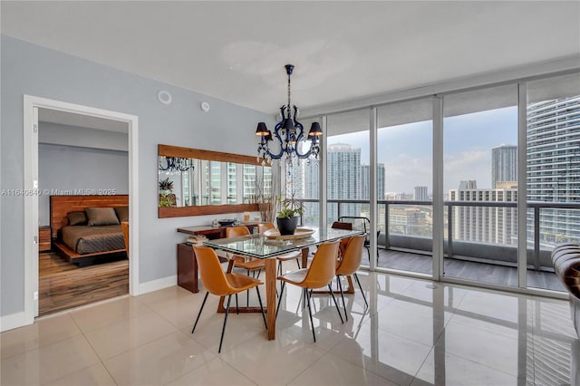 tiled dining area with expansive windows and an inviting chandelier