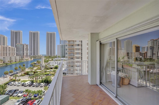 balcony featuring a water view