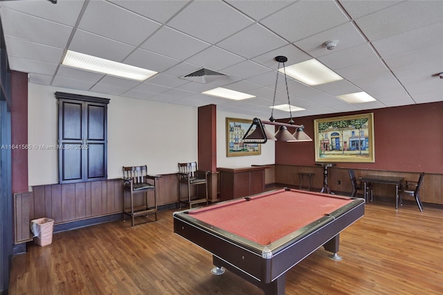 playroom featuring hardwood / wood-style floors, a drop ceiling, and pool table