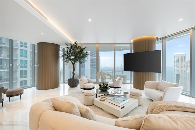 living room featuring a wealth of natural light and expansive windows