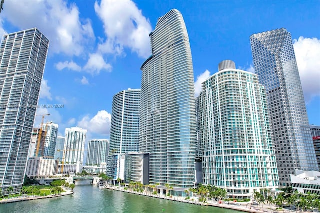 property's view of city with a water view