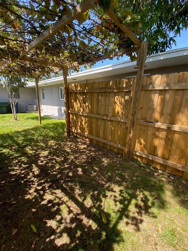 1005 NE 2nd St, Hallandale Beach, FL 33009 - view of yard featuring central air condition unit and fence