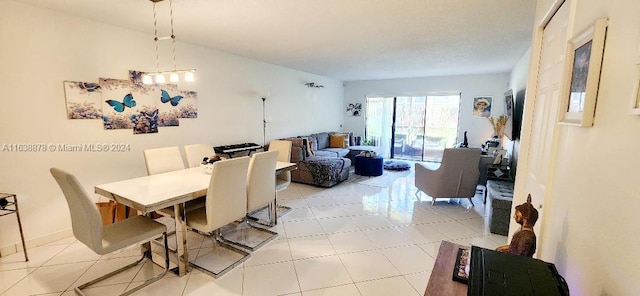 dining space with light tile patterned floors