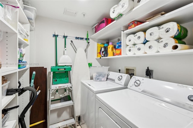 clothes washing area featuring laundry area and independent washer and dryer