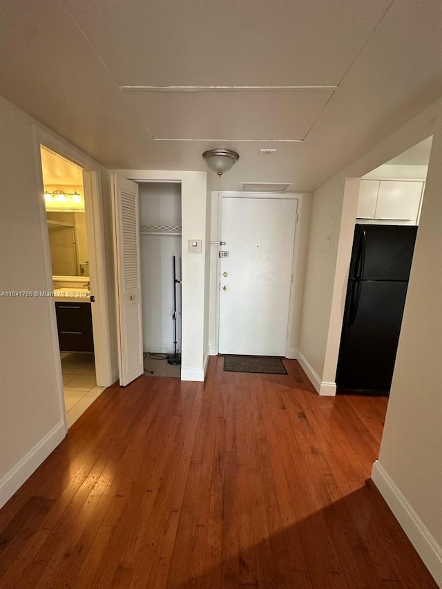 hallway with light wood-type flooring