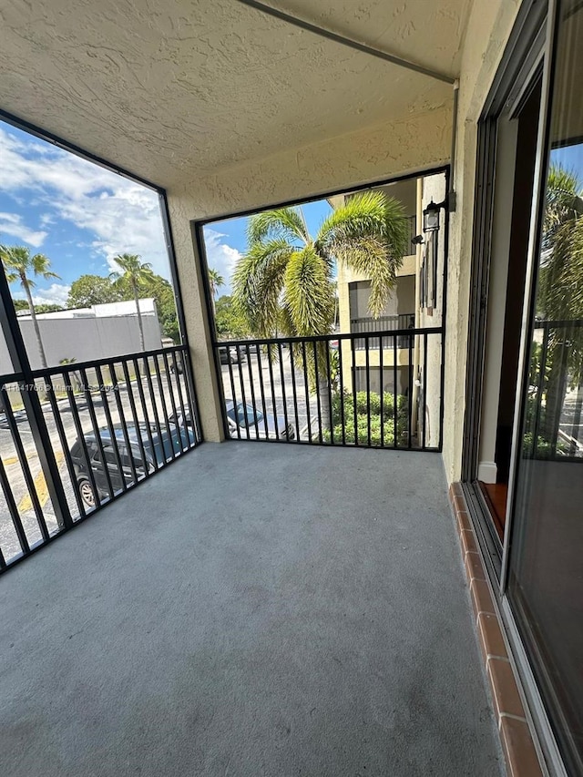 unfurnished sunroom featuring a wealth of natural light