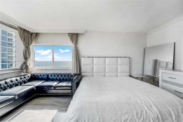 bedroom featuring hardwood / wood-style floors and crown molding