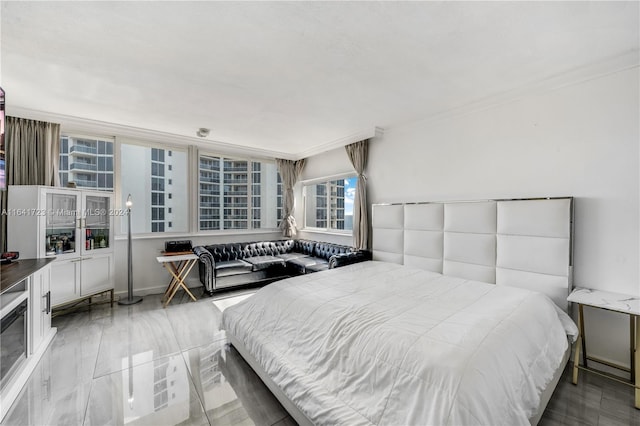 bedroom featuring crown molding