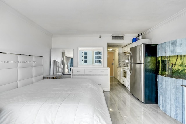 bedroom with light tile patterned flooring, crown molding, and stainless steel fridge