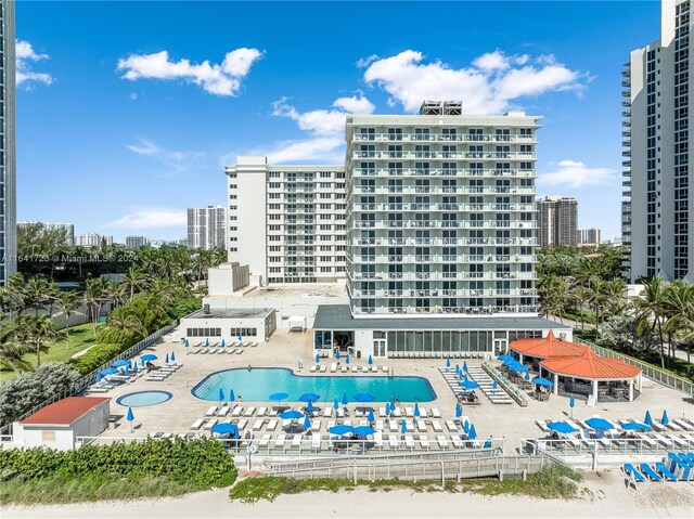 view of pool featuring a patio