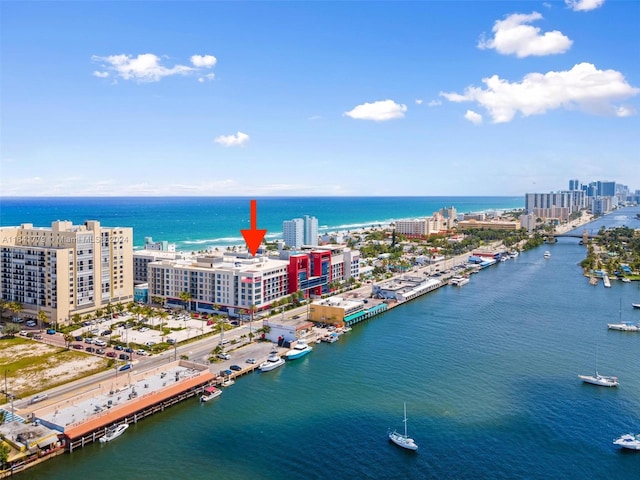 birds eye view of property featuring a water view