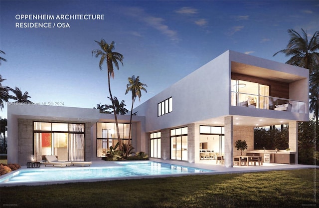 16768 Natures Way, Weston, FL 33326 - back of house with a balcony, an outdoor pool, a patio, and a yard