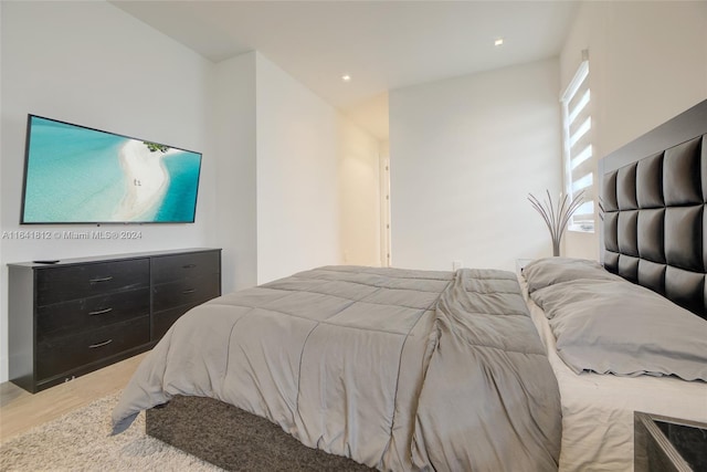 bedroom with wood-type flooring