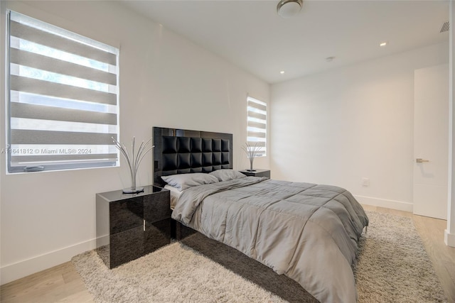 bedroom featuring light hardwood / wood-style flooring