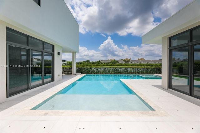 view of pool with a patio area