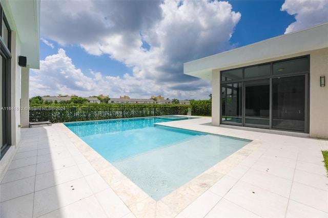 view of pool with a patio