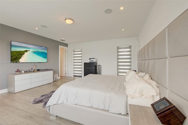 bedroom featuring light wood-type flooring