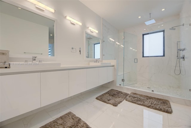 bathroom with dual vanity, tile patterned flooring, plenty of natural light, and an enclosed shower